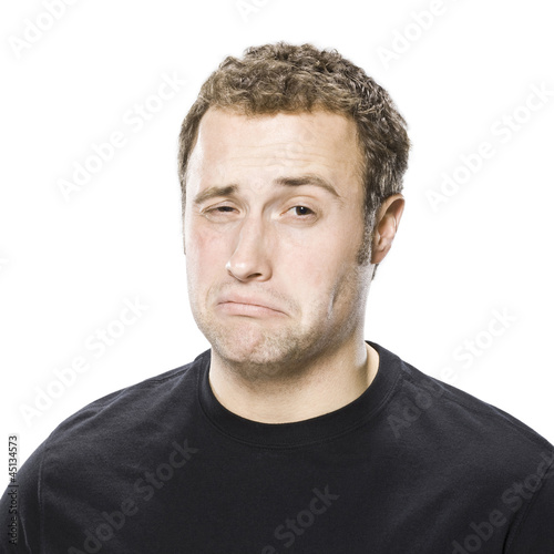 Photo: man making a disgusted face man making a disgusted face