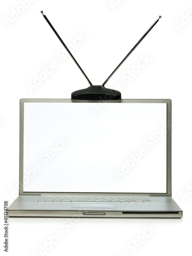 Photo: watching tv on a laptop watching tv on a laptop