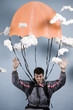 man in a jumpsuit parachuting