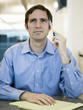 man in a blue shirt at work