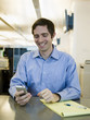 man in a blue shirt at work