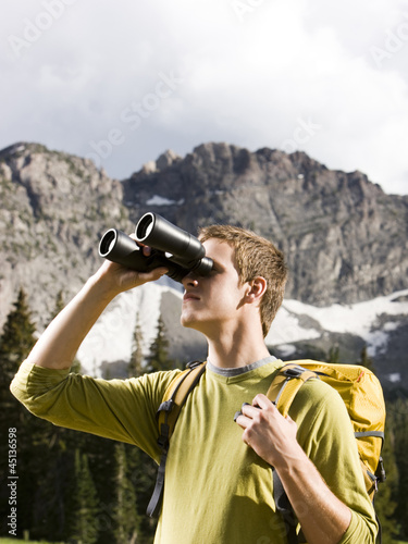 Photo: male hiker with binoculars male hiker with binoculars