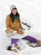 woman making a snow angel