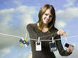 woman hanging electronics out to dry