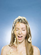 woman getting chicken noodle soup dumped on her head