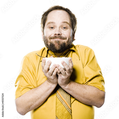 Photo: man holding a bowl of cereal man holding a bowl of cereal
