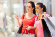 Foto: two young women shopping in mall two young women shopping in mall
