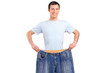 A weight loss male showing his old jeans