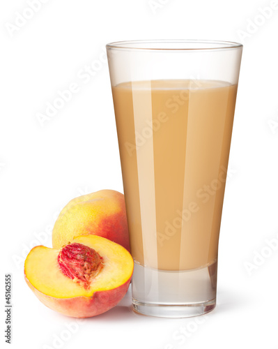 Photo: glass of peach juice on a white background glass of peach juice on a white background