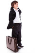 Portrait of handsome kid posing in studio with bag