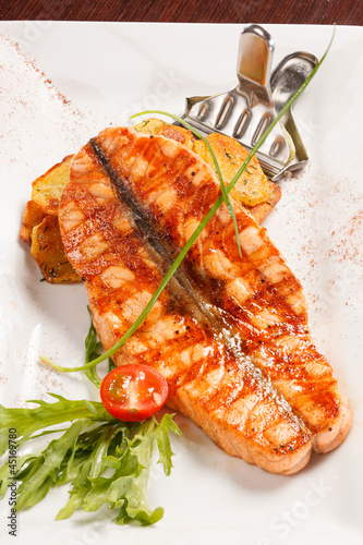 Photo: salmon steak with potatoes salmon steak with potatoes