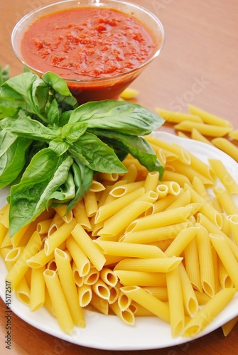 Photo: pasta maccaroni tomato and basil leaf pasta maccaroni tomato and basil leaf