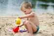Photo: Child playing in the sand Child playing in the sand
