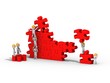 Travail d'équipe autour d'un puzzle