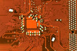 Close up of red computer circuit board