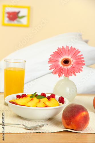 Photo: light breakfast on the nightstand next to the bed light breakfast on the nightstand next to the bed