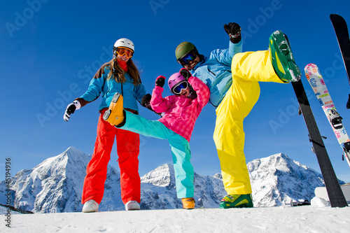 Photo: Skiing, winter fun - happy family ski team Skiing, winter fun - happy family ski team