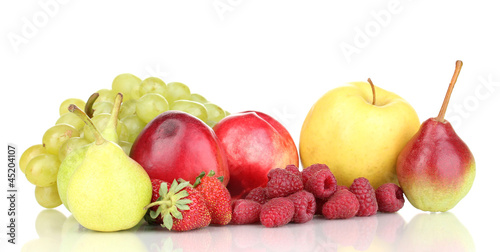 Photo: Mix of ripe sweet fruits and berries isolated on white Mix of ripe sweet fruits and berries isolated on white