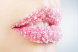 Woman's lips strewed with sugar