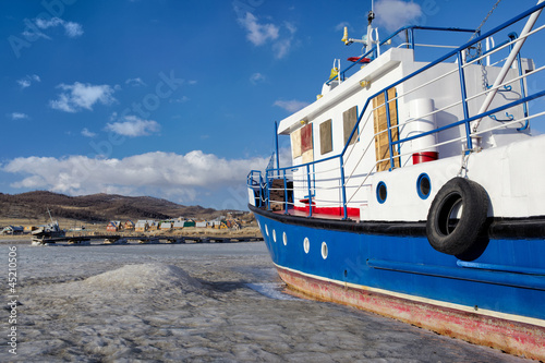 Photo: boat in frozen baikal boat in frozen baikal