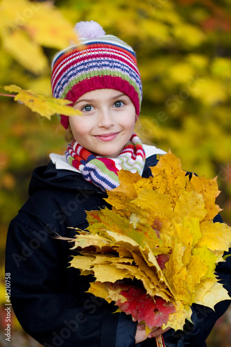 Photo: Autumn portrait - lovely girl in autumn park Autumn portrait - lovely girl in autumn park
