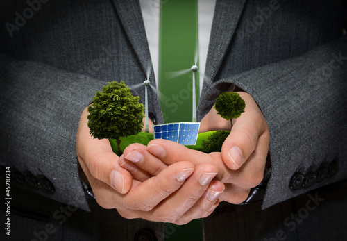 Photo: Hands hold Green Energy Hands hold Green Energy