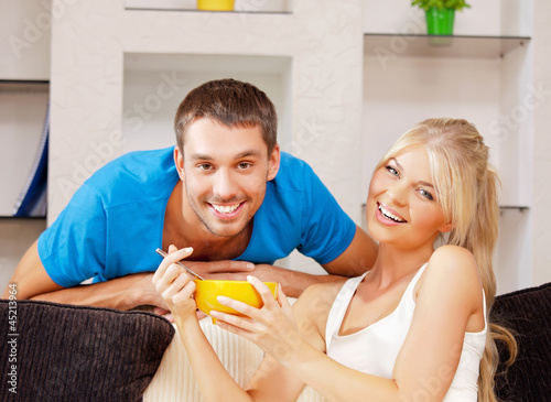 Photo: happy couple at home happy couple at home