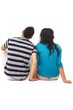 A young people sitting, back-view
