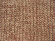 Texture of brown knitted linen