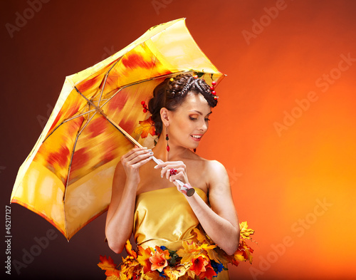 Photo: Girl with autumn hairstyle and make up. Girl with autumn hairstyle and make up.