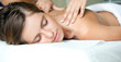 Young woman getting a massage in a spa