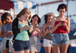 Young Ladies Using Their Phones