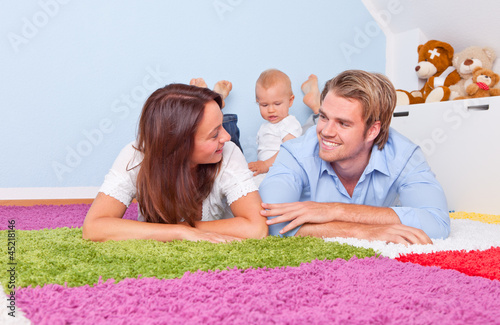 Photo: family time couple with baby family time couple with baby