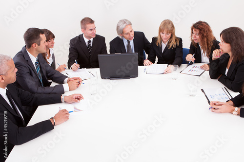 Photo: Businesspeople In Meeting Businesspeople In Meeting