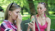 Video: Happy female applying beauty make-up in the park Happy female applying beauty make-up in the park