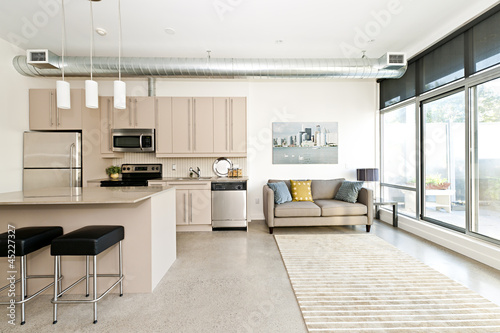 Photo: Modern condo kitchen and living room Modern condo kitchen and living room