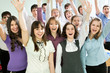 Students with hands raised