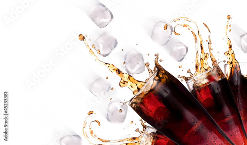 Photo: Fresh coke background with ice Fresh coke background with ice
