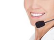 Cheerful call center operator against white background