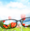 Reading eyeglasses and beautiful nature view. Sight care concept