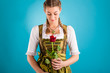 Young woman in traditional clothes - dirndl or tracht