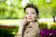 Photo: Woman in a retro style in the city Woman in a retro style in the city