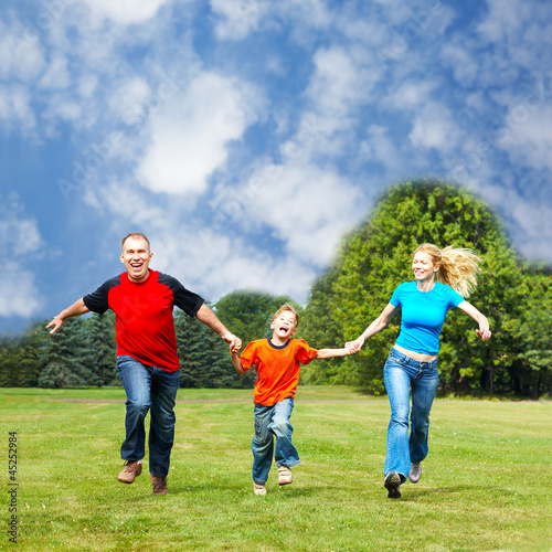 Photo: Happy running family. Happy running family.