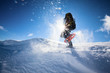 Hiker in winter mountains snowshoeing