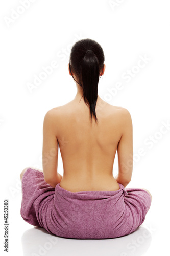 Photo: Young beautiful nude woman with towel Young beautiful nude woman with towel
