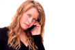 Teenage girl on her cell phone isolated white background