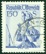 stamp printed in Austria, shows a woman in national dress