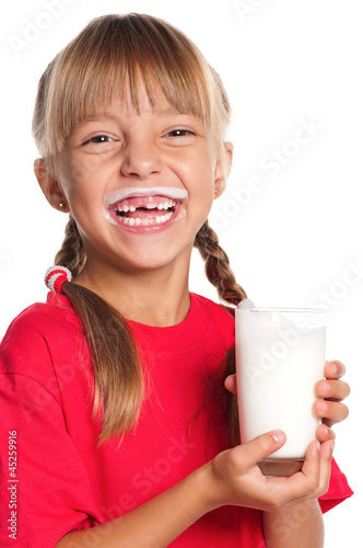 Photo: Little girl with glass of milk Little girl with glass of milk