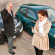 Woman and man on phone car crash
