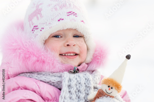 Photo: Child with snowman Child with snowman